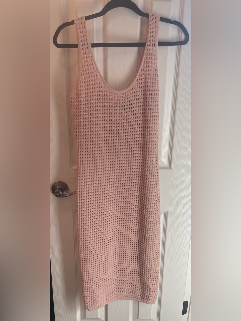 Midi form fitting dress with zipper in back.